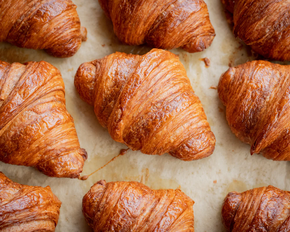 A pile of freshly baked croissants