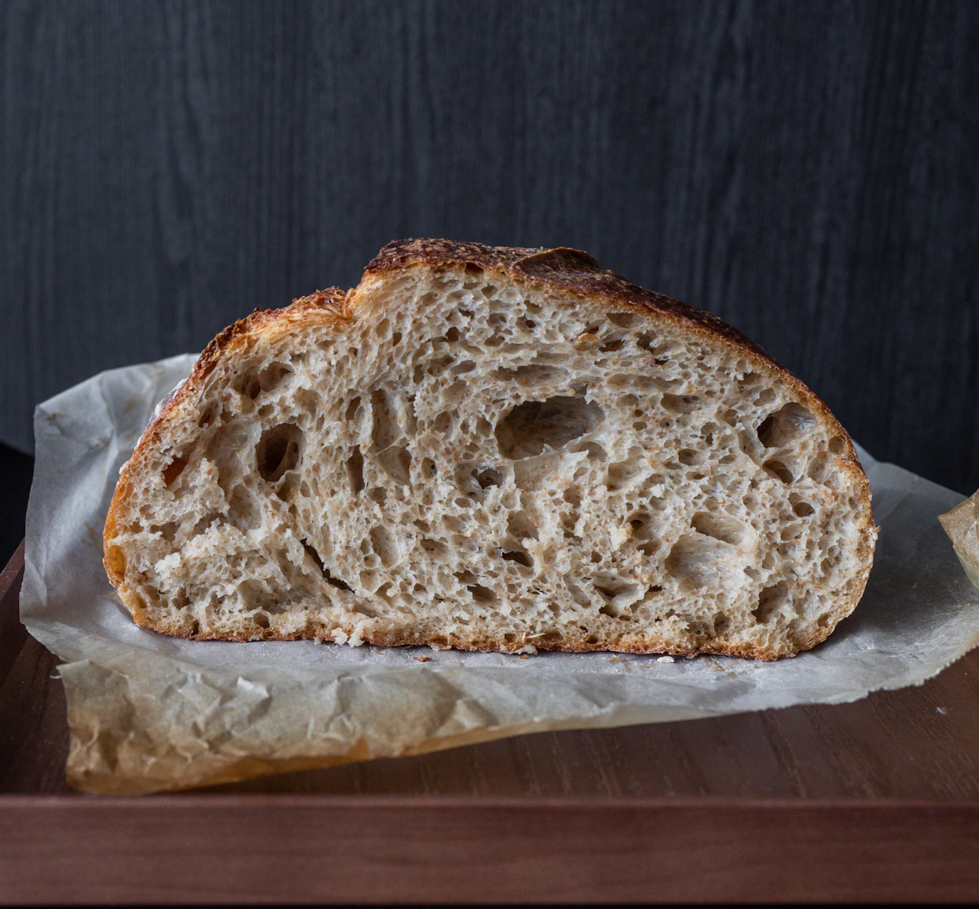 A crusty loaf of sourdough, cut open